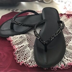 GENTLY Worn Black/Sparkle Flip Flops size 8
